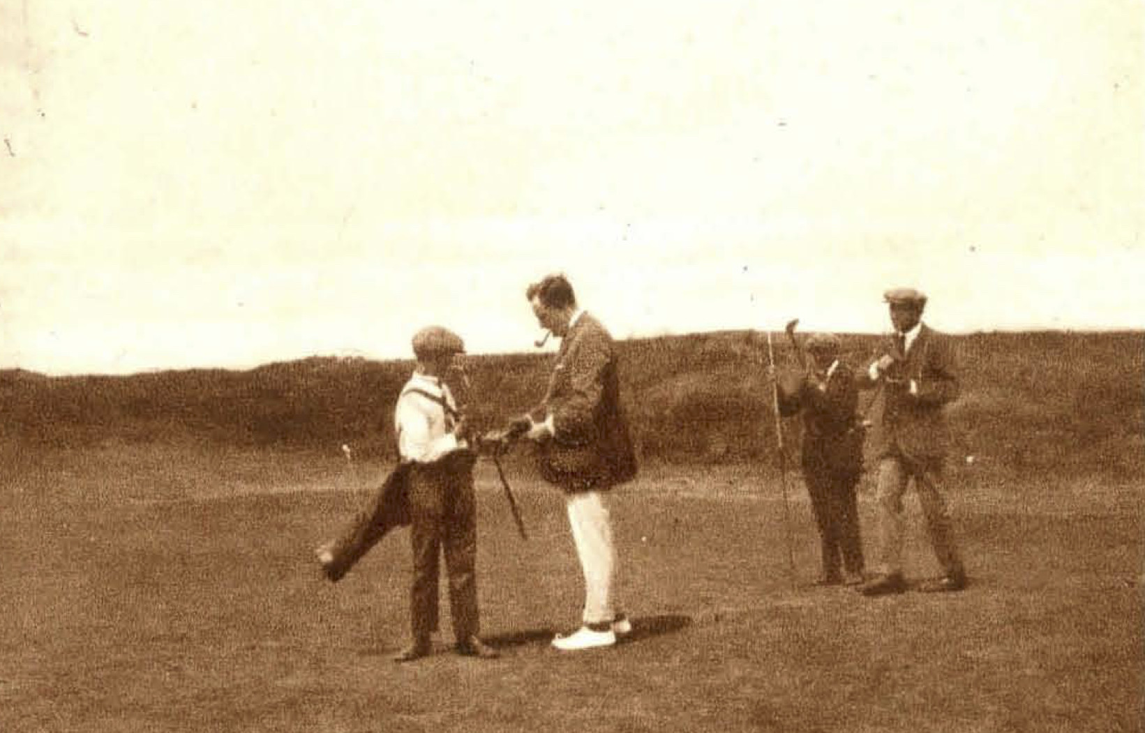 Del Court en Snouck op 9de green - 1923