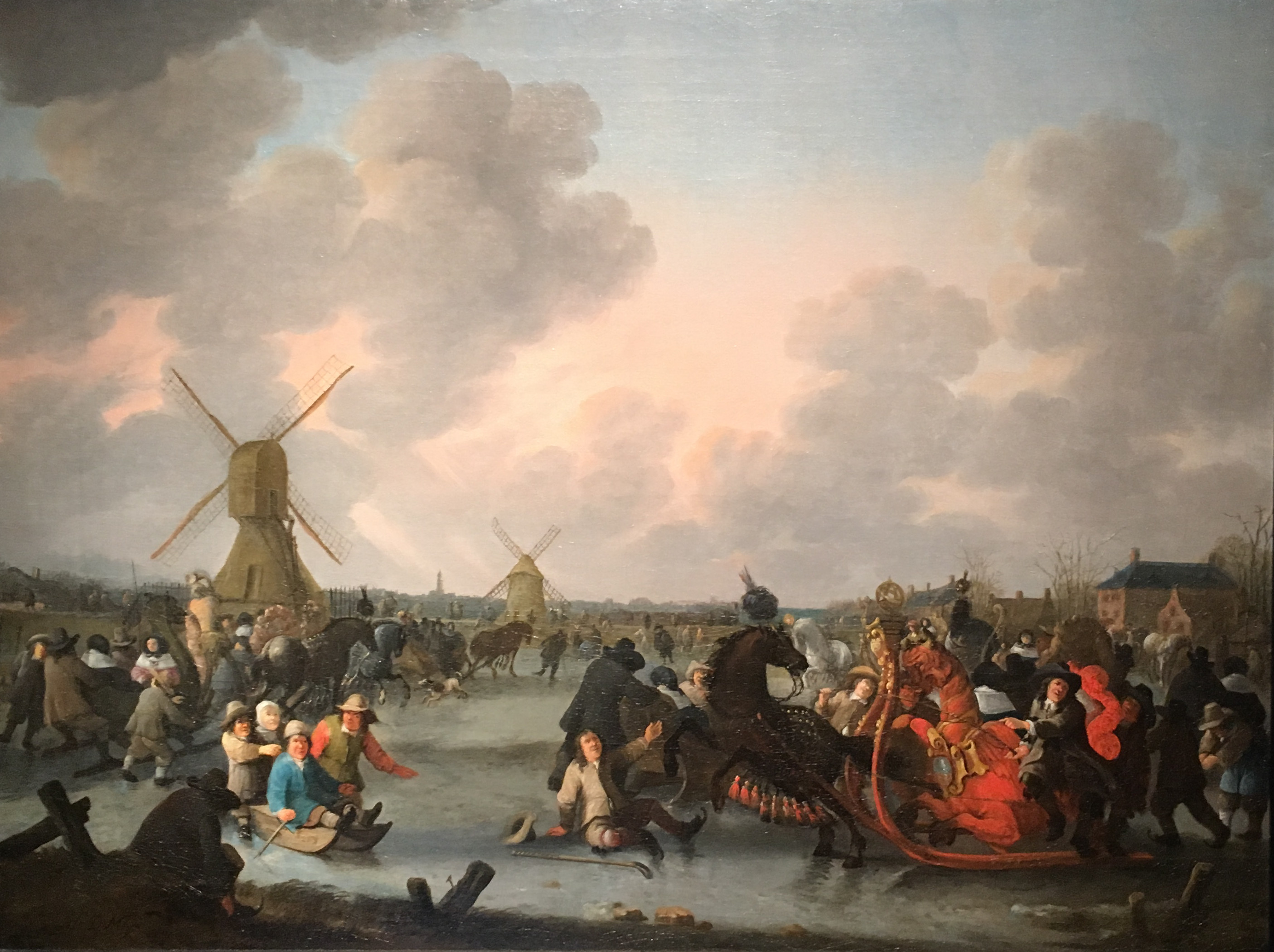 Hendrick de Meijer, Ice Skaters and decorated horse-drawn sleigh on a frozen river with windmills. 1662