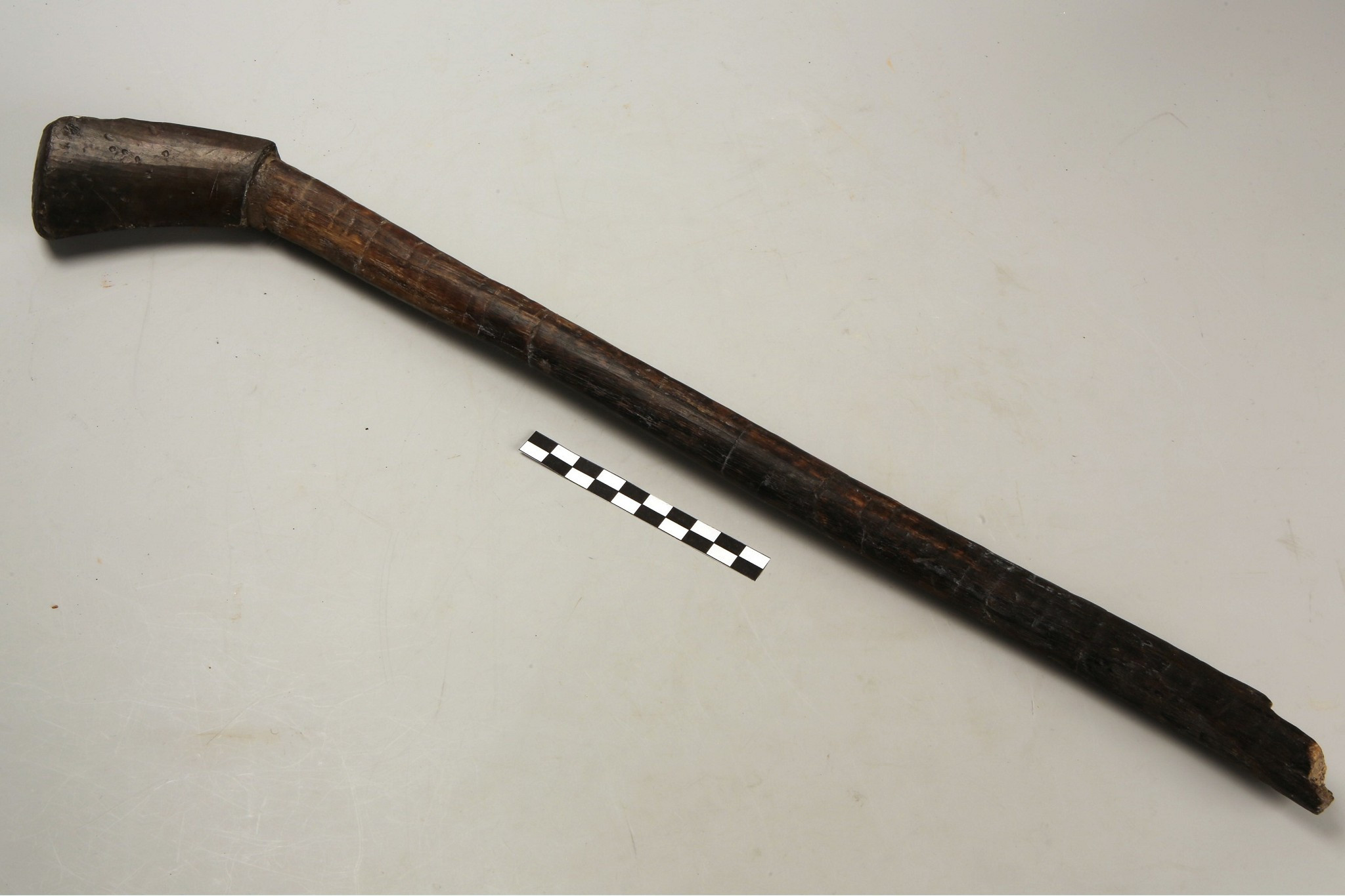 Colfstok met loden slof. 16e eeuw